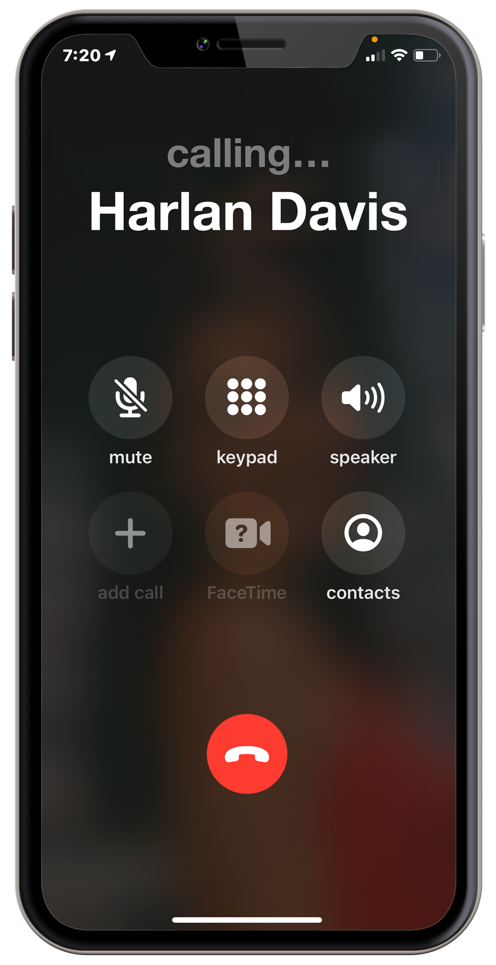 iPhone X with screen displaying phone call screen, calling Harlan Davis.
